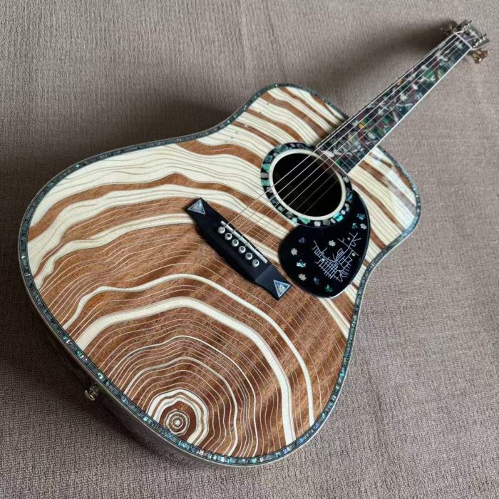 Requires custom-made guitars ， All solid acoustic guitars.